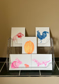 Set van 5 kaarten met grafische neonprinten met dieren op een beige achtergrond.