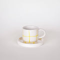 Kop en schotel espresso van Magazin Minori in geel grid patroon