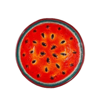 Bovenaanzicht glazen schaaltje in rood en groen met watermeloenpatroon op een witte achtergrond.