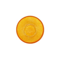 Bovenaanzicht glazen oranje effen schaaltje op een witte achtergrond.